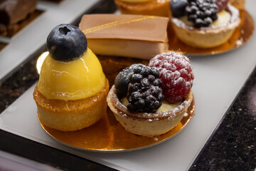 Austrian desserts, different types of chocolate and fruit cakes in traditional bakery cafe in Vienna, close up