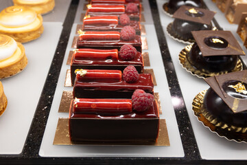Austrian desserts, different types of chocolate and fruit cakes in traditional bakery cafe in Vienna, close up