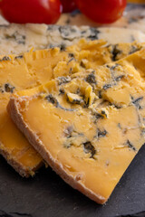 Cheese collection, English cow milk semi-soft, crumbly old blue stilton and blue shropshire cheeses
