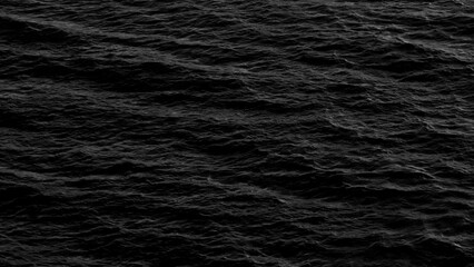The motion of black and white sea waves unfolds beautifully, with the gentle yet dynamic movement...