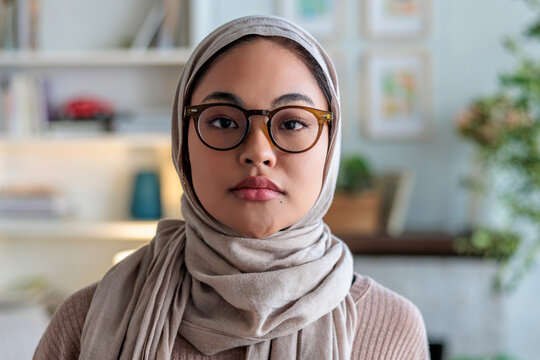 Portrait of young woman in abaya