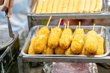 Hottang is short for hotdog kentang (kentang means potato). One of the popular snacks in Korea.