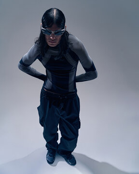Fashion model showcases futuristic style during photoshoot