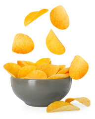 Tasty crispy potato chips falling into bowl on white background