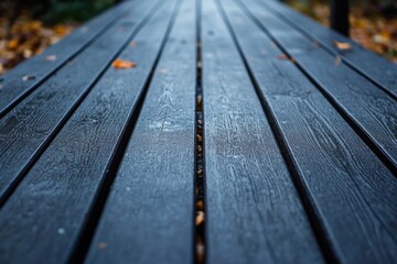Close up view of wet wooden deck with visible texture and water droplets