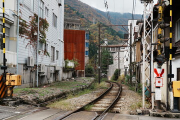 Scenic Railway Track Curving Through the Rural Town of Unazuki Onsen, Japan