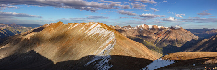 Rising behind and to the right of colorful Colorado 13er UN13544 are 14ers Red Cloud and Sunshine. ...