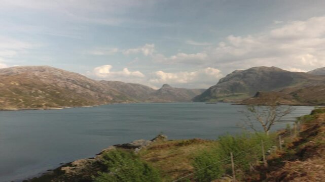 Panning shot of the stunning scenery at Unapool on the NC500 route