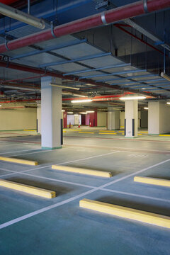 Spacious empty parking area in a modern Dubai building