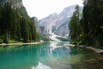 Scenic view of Lago di Braies surrounded by majestic mountains