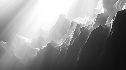 Abstract grayscale mountain peaks bathed in ethereal light create dreamy vistas