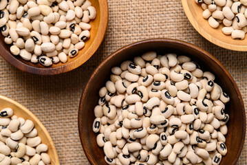 Black-eyed pea or cowpea in wooden bowl, Food ingredient, Top view