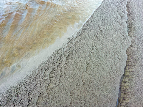 Intertidal stream on beach