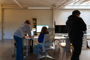 Creative Team Working Late in Office