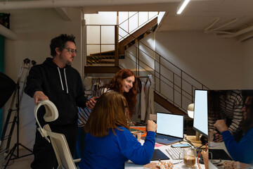 Creative Team Working Late in Office