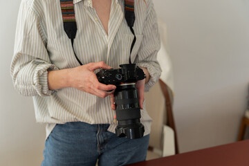 Photographer holding camera