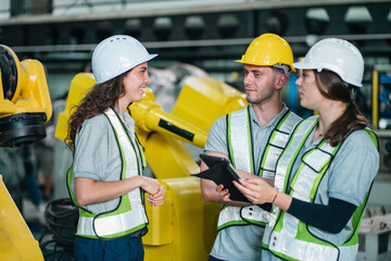 Female Engineer Working in Factory, Professional in the Manufacturing Industry, Wearing Uniform for...