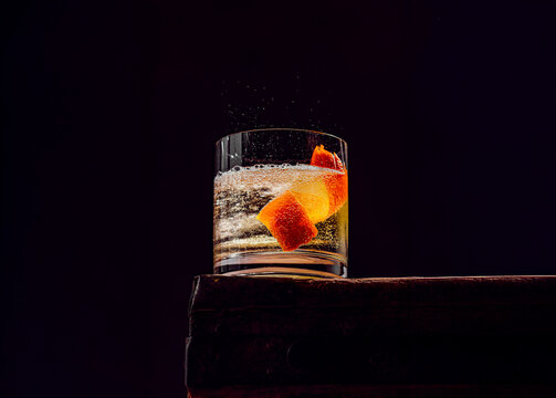 Soda bubbling in a whiskey cocktail