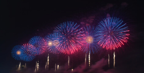 Colorful fireworks exploding at english bay against sky