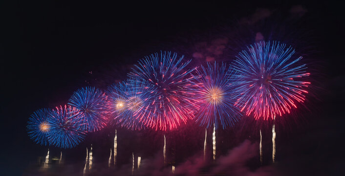 Colorful fireworks exploding at english bay against sky