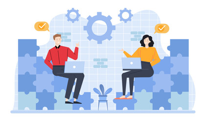 Two people working on laptops on puzzle pieces, great for teamwork, collaboration, problem-solving, technology, business, and innovation concepts.