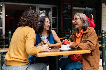 Surprised woman receiving a gift.