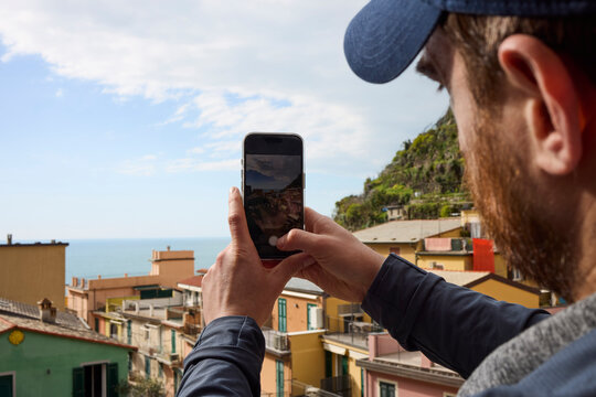 Man taking photos of his trip