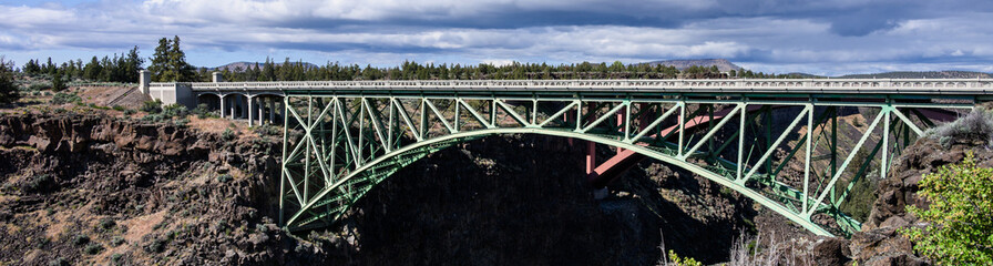 Two highway bridges over the crooked river gorge in central Oregon, scenic day for spring travel
