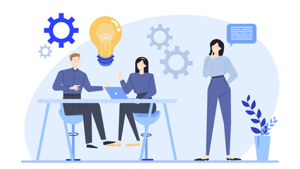 Three people collaborating at a desk. Ideal for illustrating teamwork, brainstorming, office environment, or group projects in a business setting.