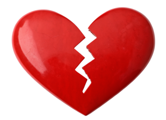 A glossy red heart split in two with a jagged black line against a solid black background studio shot