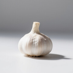 Single garlic bulb isolated on white background