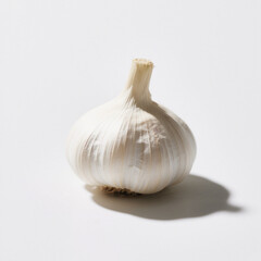 Single garlic bulb isolated on white background