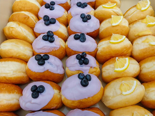 Colorful donuts, delicious and sold at a market.