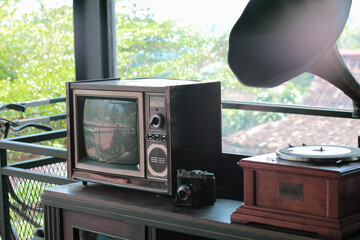 Perfect illustration for retro background style, with old tv, retro camera, gramophone on a desk...