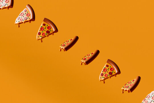  Pizza slices floating diagonally across empty background