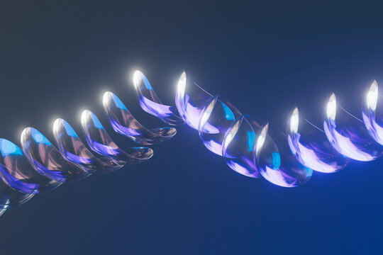  Symmetrical abstract helix glowing with purple and blue light