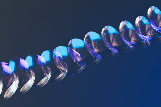  Geometric glowing spiral design in deep blue ambient light