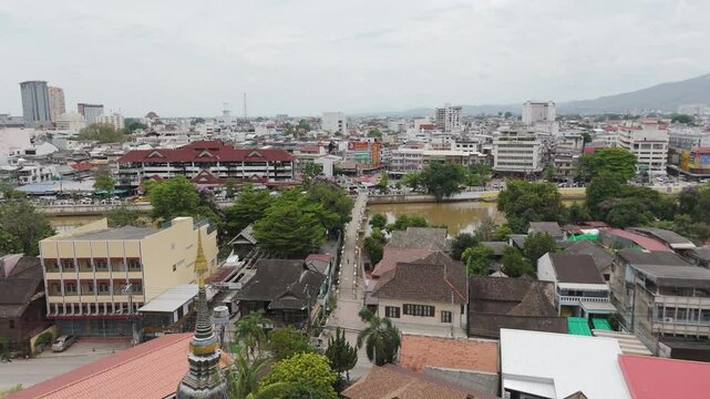Temple Stupa At Wat Ket Neighborhood On The East Side Of The Ping River In Chiang Mai, Thailand. Aerial Drone Shot