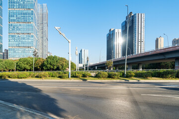 Fototapeta premium Empty urban road and buildings in the city