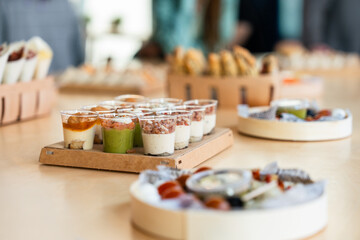 Assorted appetizers on trays in a casual setting