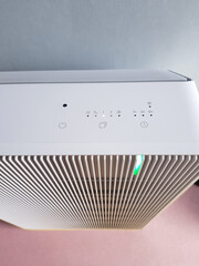 Air conditioner on a white wall