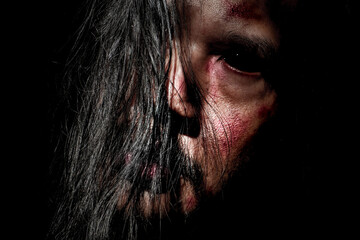 Creepy Portrait of a Man with Long Hair in the Dark, Scary portrait of a man with long messy hair...