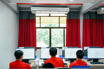 Student study in class computer technology at the elementary school. Education concept.