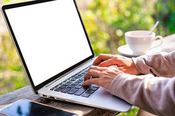 Young woman freelancer traveler working online using laptop while traveling on vacation, Freelance and workation concept