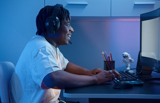 Gamer winning online competition using computer at home