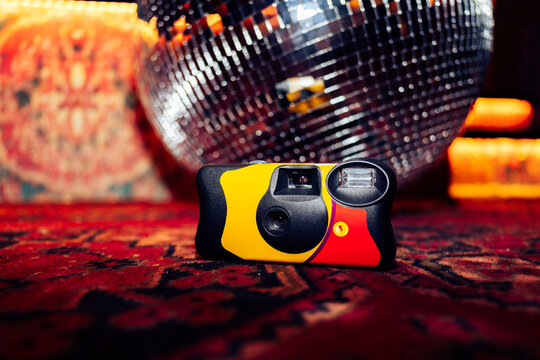Disposable camera on disco ball