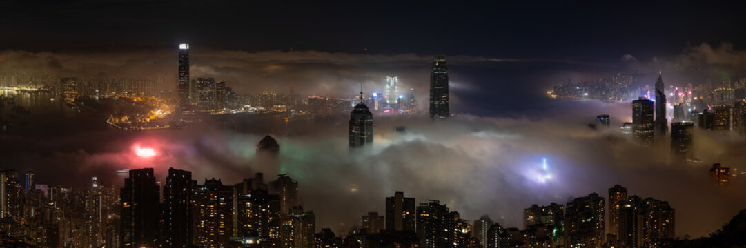 Hong Kong Skyline covered in Fog at Night