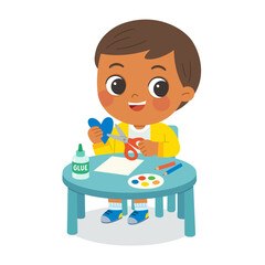 Kid Making Paper Craft with Scissors and Glue. Child Cutting Paper Heart in Art Class Activity. Preschool Boy Enjoying Arts and Crafts at Desk. Kids Creativity,  Education Concept.