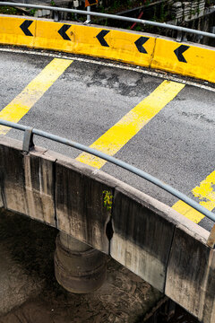 Urban curve with directional yellow markings