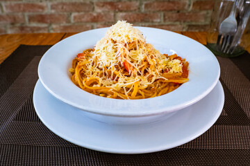 Spaghetti with vegetable sauce and Parmesan cheese